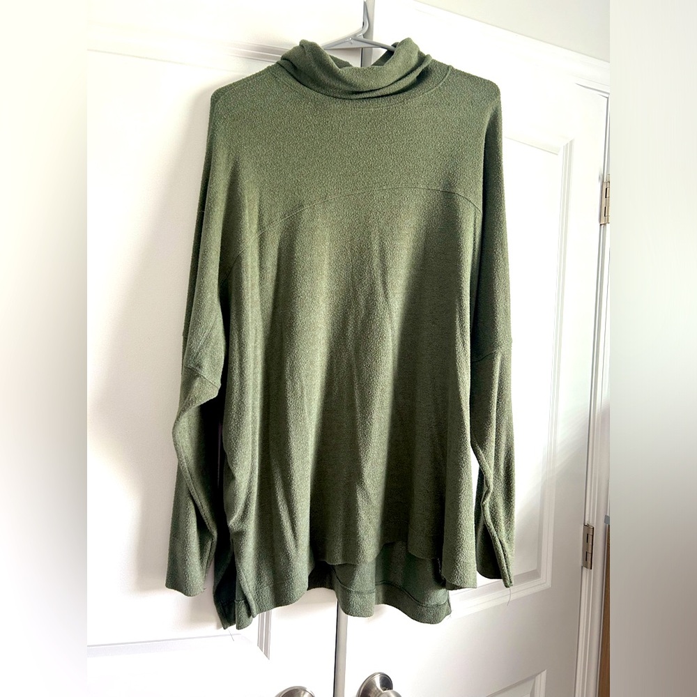 Green turtleneck shirt